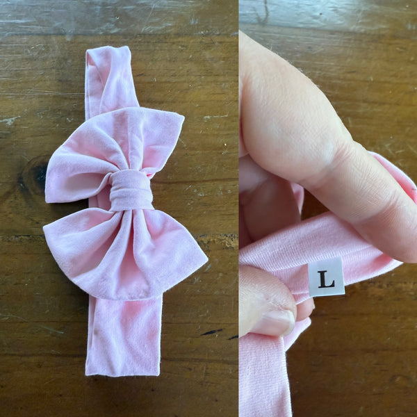 Pale pink Sz L bow 21.5cm 1-3y NWOT