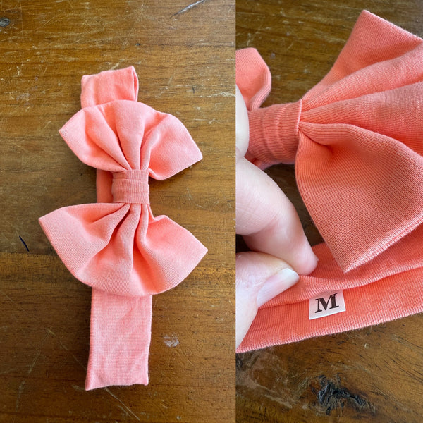 Peach Sz M bow 19cm 6-12m NWOT