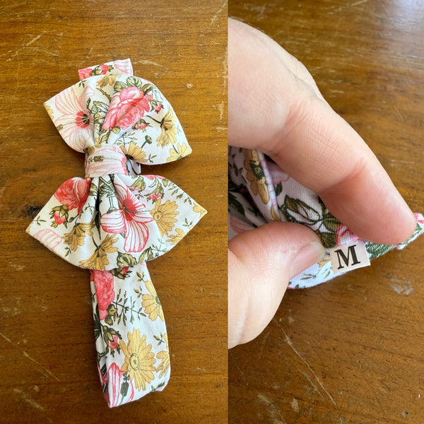 White floral Sz M bow 19cm 6-12m NWOT