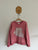 Little Auguste pink jumper Sz 9-10 play only due to dot on back of arm as pictured