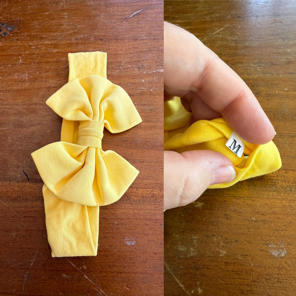 Yellow Sz M bow 19cm 6-12m NWOT