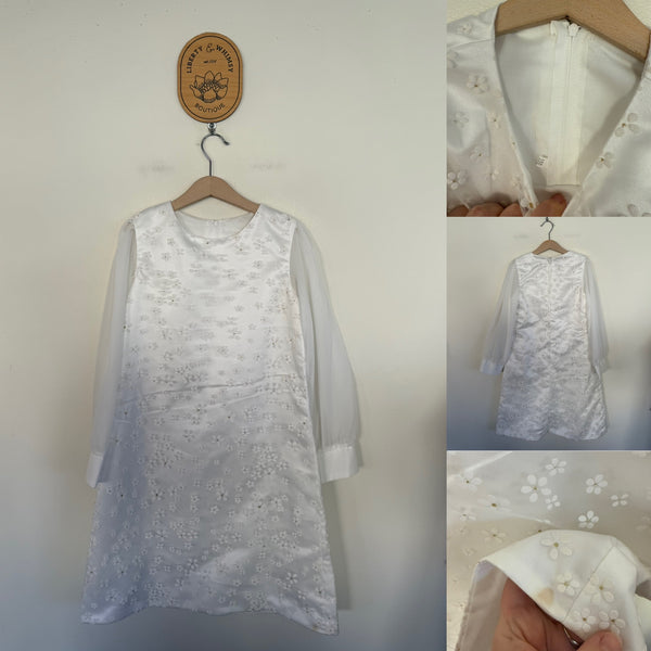 Brand unknown l/s white flower dress Sz 10 as new but play due to mark on hem as pictured