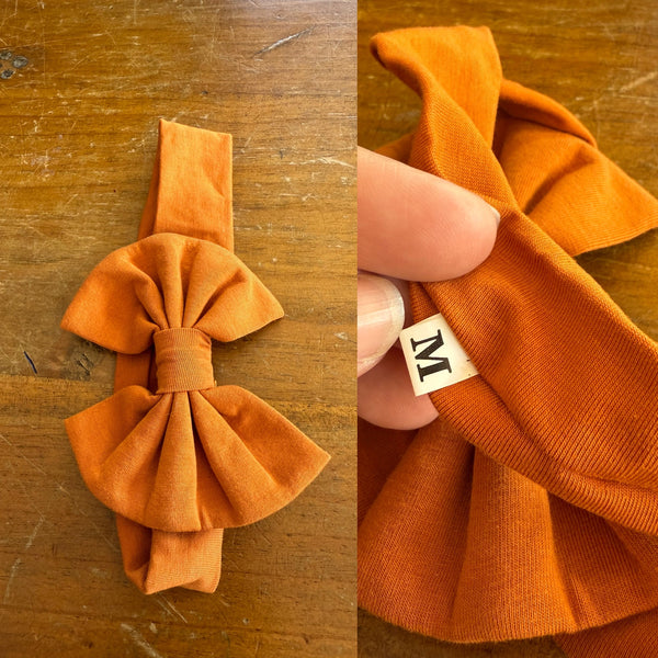 Marigold Sz M bow 19cm 6-12m NWOT