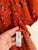 Next terracotta animal print romper Sz 12 as new (looks unworn)