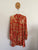 White Closet terracotta floral dress Sz 12 as new, waistband is slightly twisted