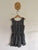 Next black and white print play suit Sz 7 EEUC