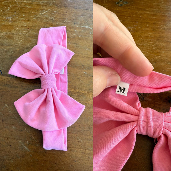 Light pink Sz M bow 19cm 6-12m NWOT