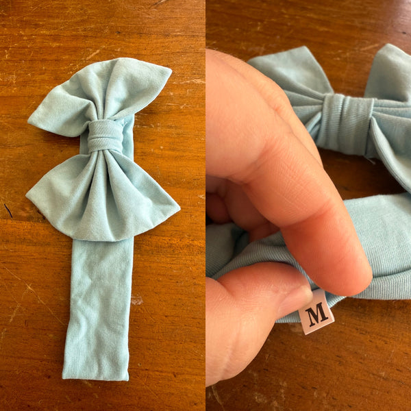 Muted blue Sz M bow 19cm 6-12m NWOT
